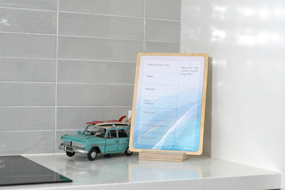 Weekly Whiteboard Planner on a display stand in kitchen