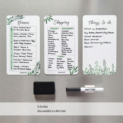 Magnetic meal planner shopping list and to do list on a silver fridge 